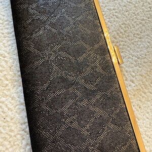 Elegant Black and Gold Clutch